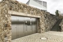 Natural stone wall with integrated toilet facilities